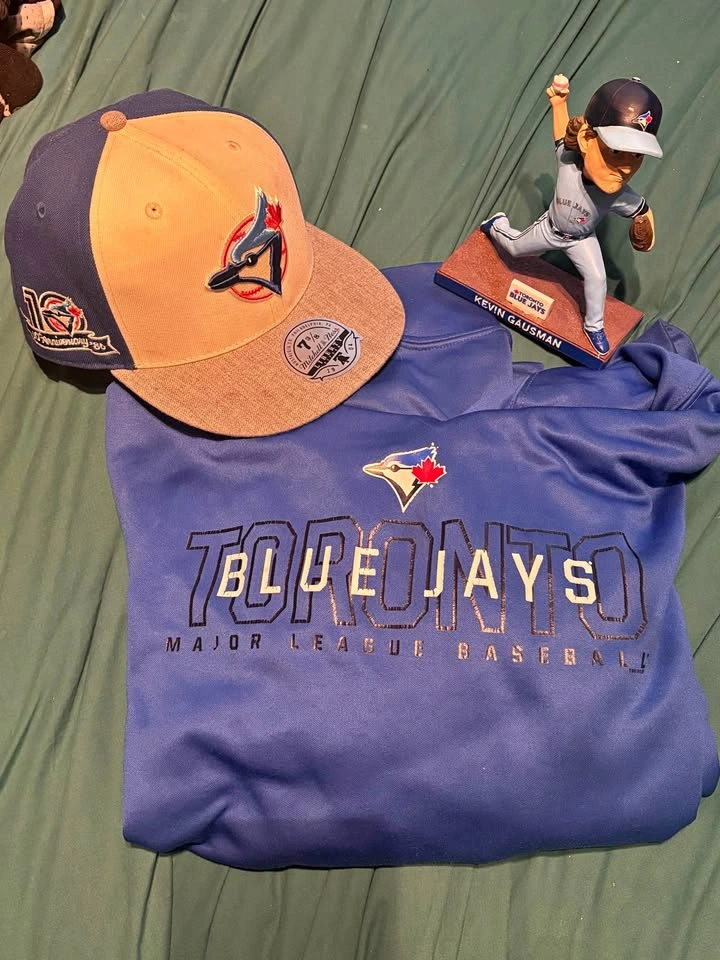 Kevin Gausman Bobblehead, Blue Jays Hat, and Sweater Bundle