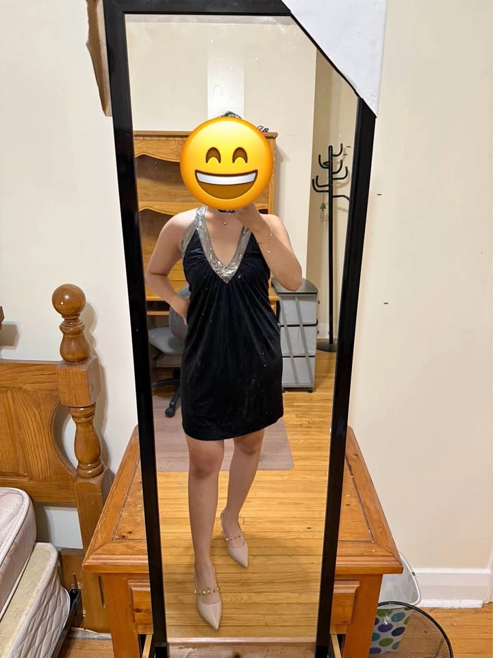 Black dress, halter neckline, backless