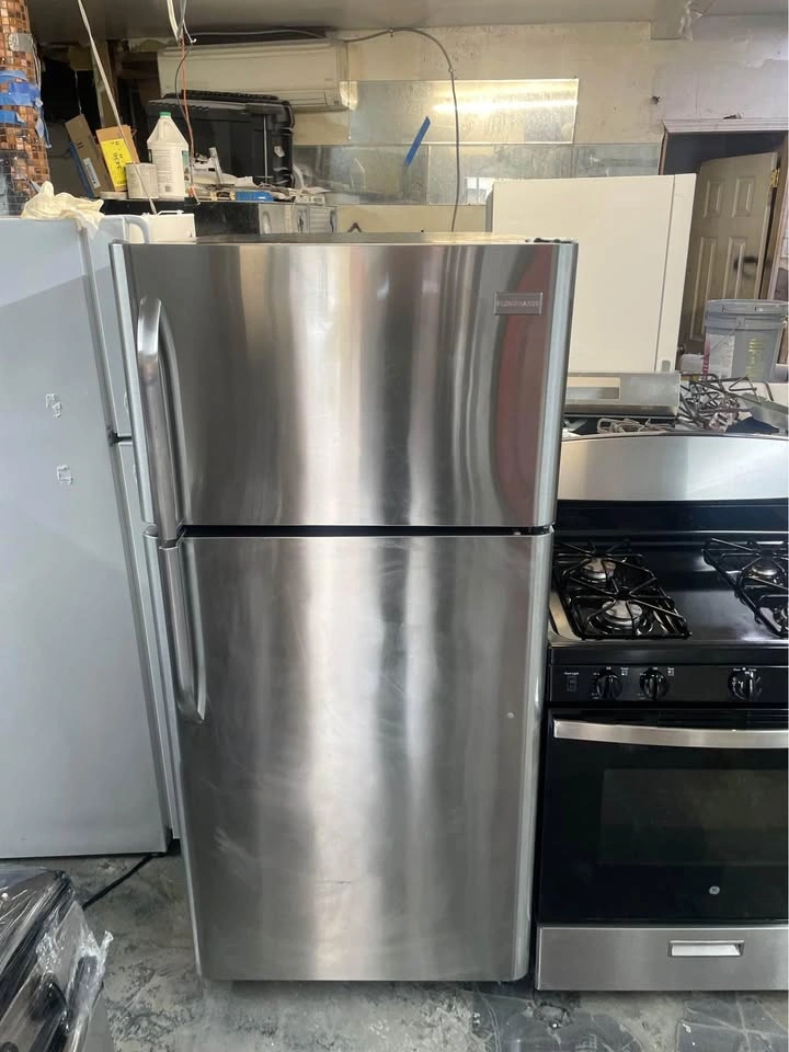 30 inch black and silver fridge and stove - photo 2
