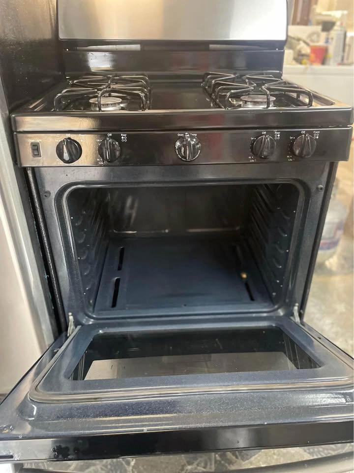 30 inch black and silver fridge and stove - photo 3