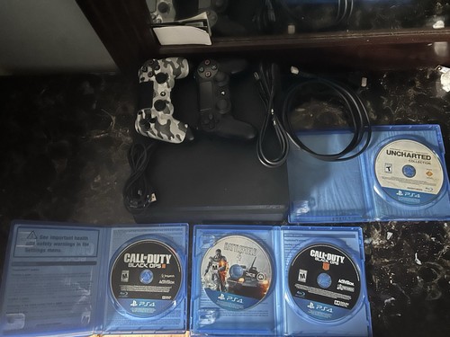 PS4 Slim 500GB Bundle with 4 Games and 2 Controllers