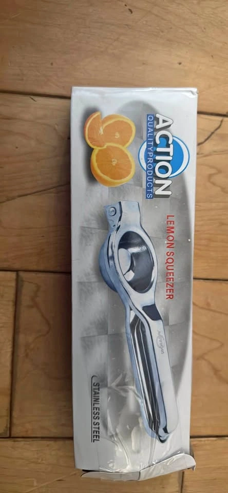 Brand new stainless lemon squeezer