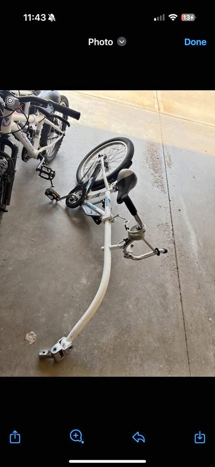 Tag along bike attachment