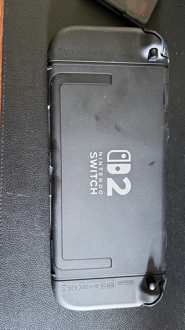 Nintendo Switch 2 Bundle (Includes Pro Controller + 3 Games) - photo 2