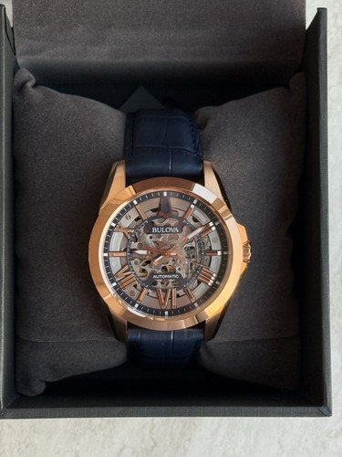 Bulova Sutton Men's 43mm Automatic Skeleton Dial Rose Gold/Blue