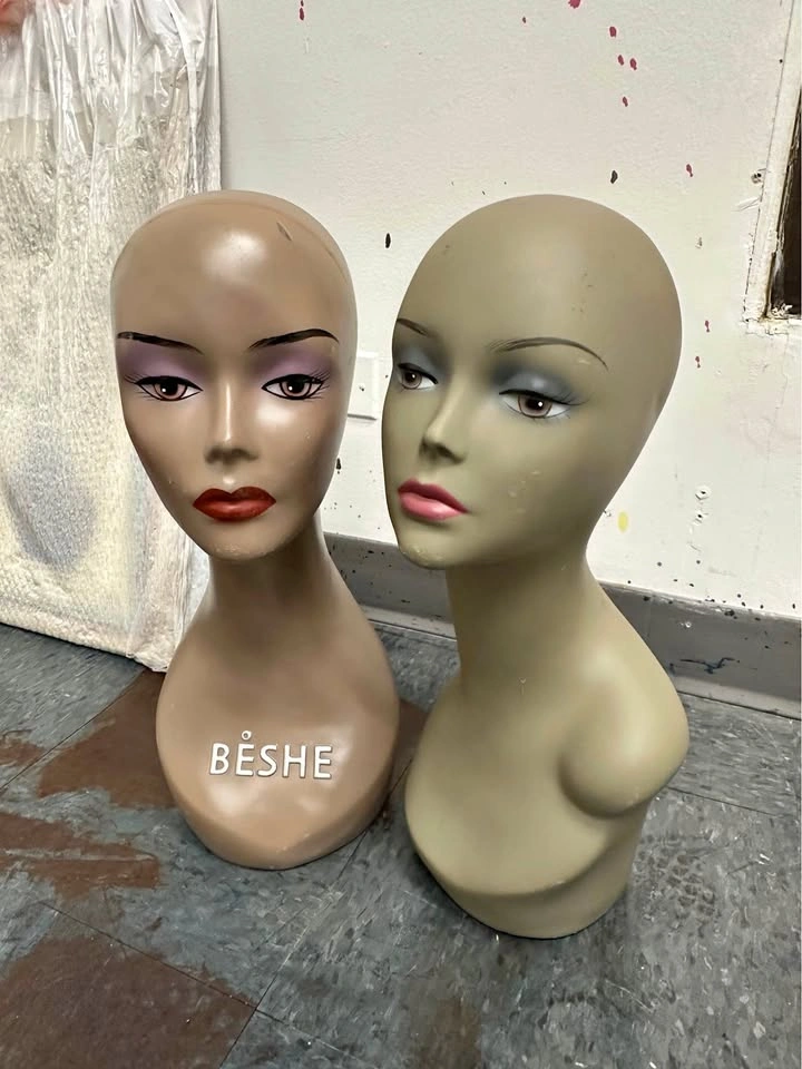 2 mannequin heads