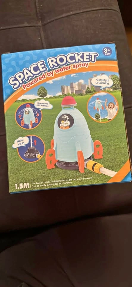 Space rocket powered by water spray outdoor toy