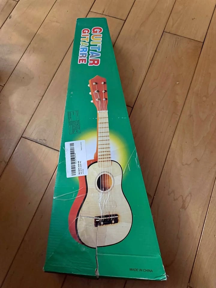 Brand new kids guitar in box