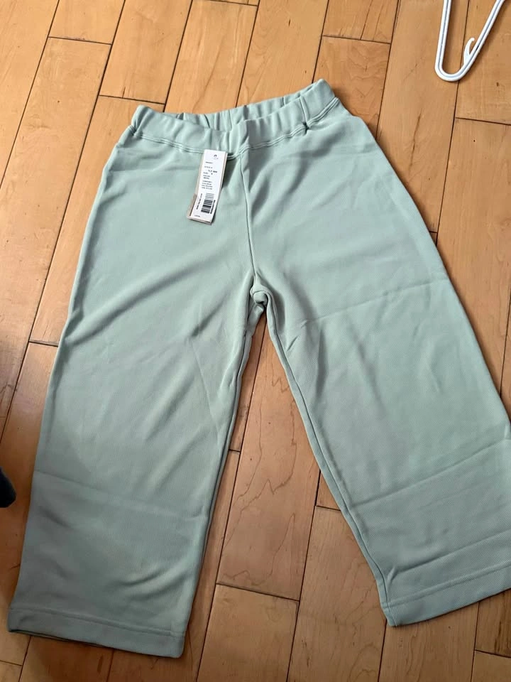 Brand new size small green capris