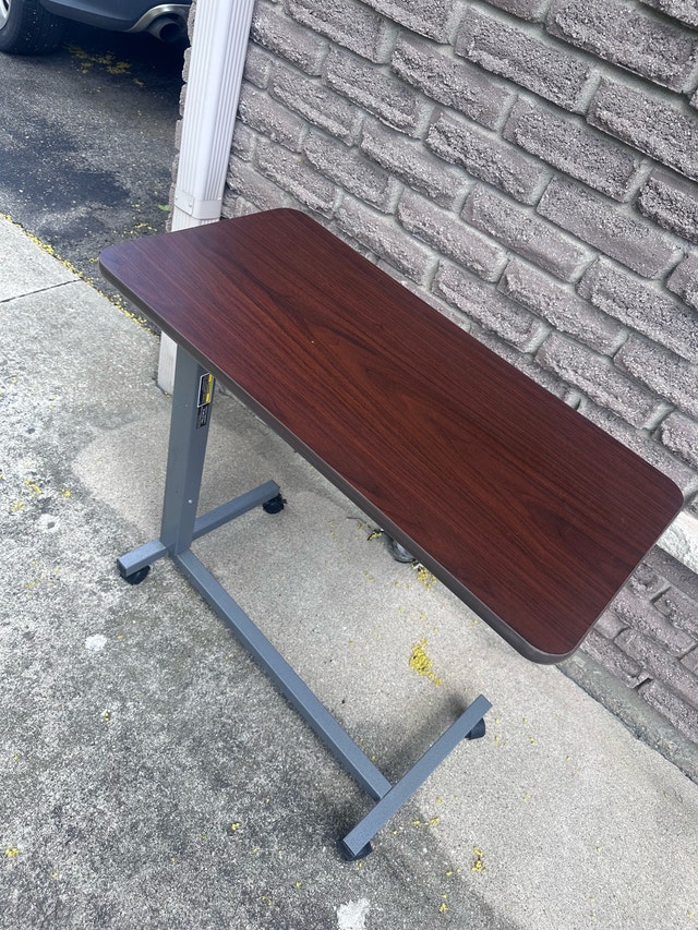 Height adjustable medical grade side table