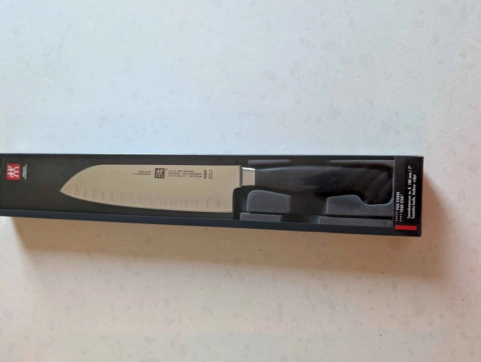 Zwilling J.A. Henckels Four Star 7" Santoku Knife