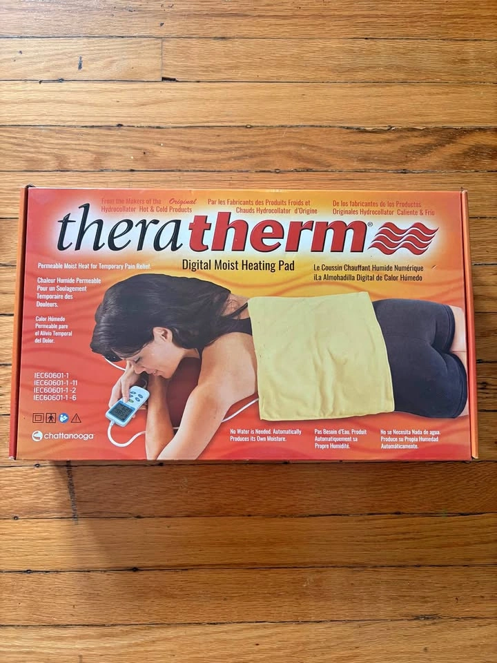 Theratherm heating pad - brand new, never opened