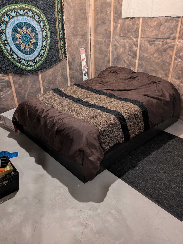 Full Size Storage Bed with mattress and bedding