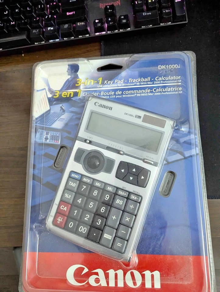 Canon 3 in 1 keypad, trackball calculator