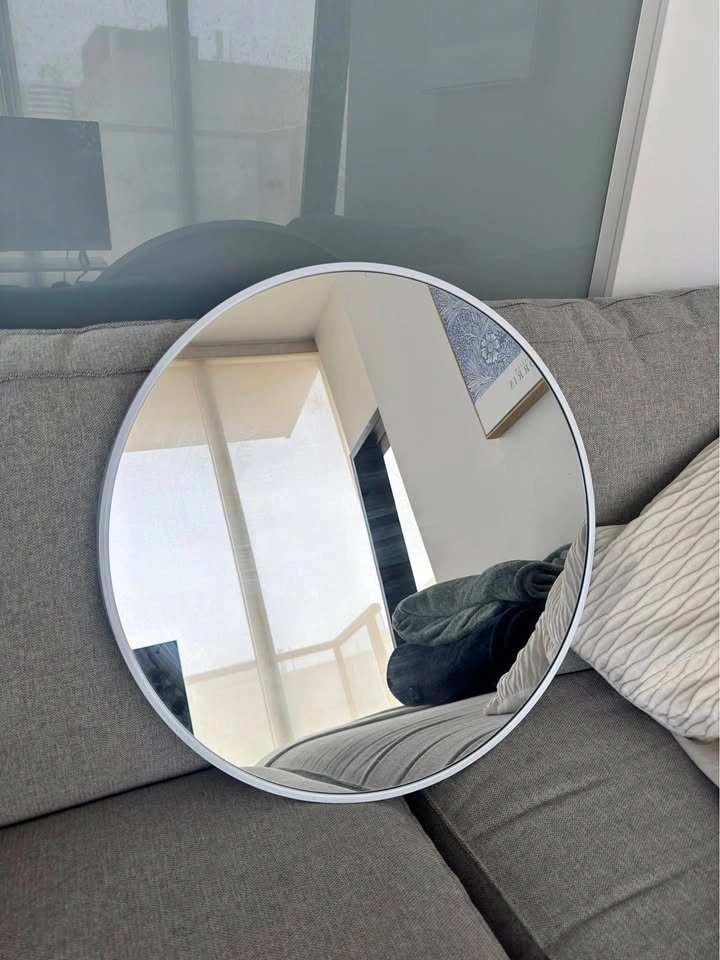Circular white mirror