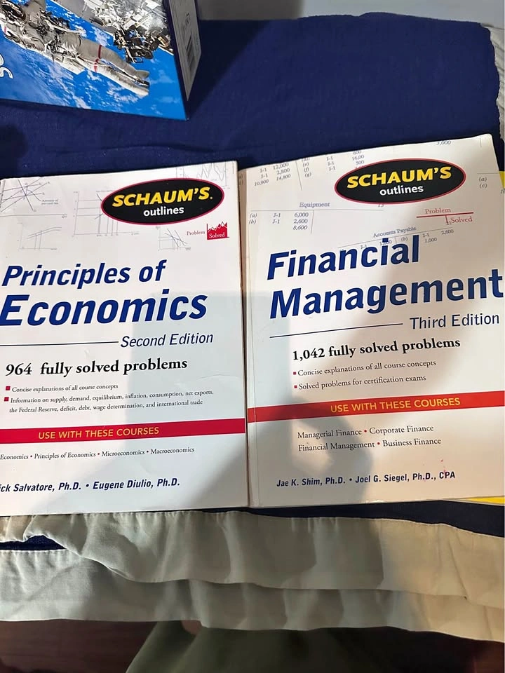 Schaum’s economics and financial management