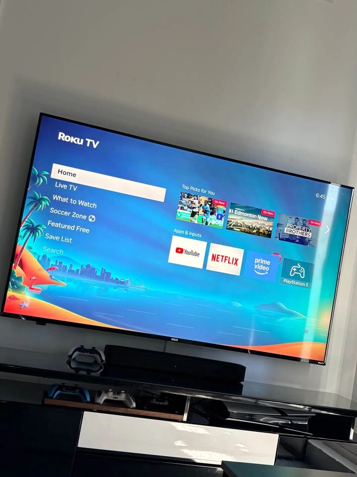 RCA ROKU TV— 70” - photo 3