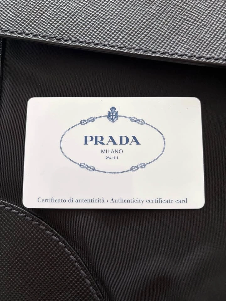 Authentic Prada Tessuto Nylon & Saffiano Leather Clutch - photo 2
