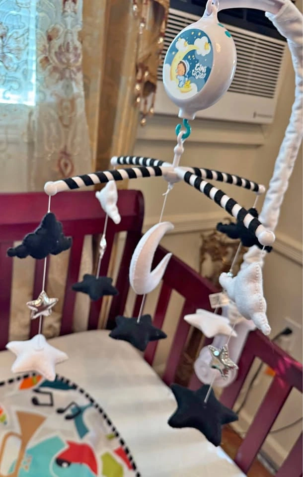 Nursery mobile for crib with music