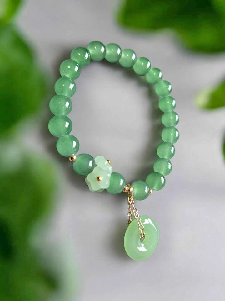 Green Beaded Bracelet w/ Flower Charm & Donut Pendant