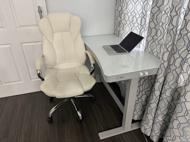 Height-adjustable glass-top desk + revolving chair - photo 2