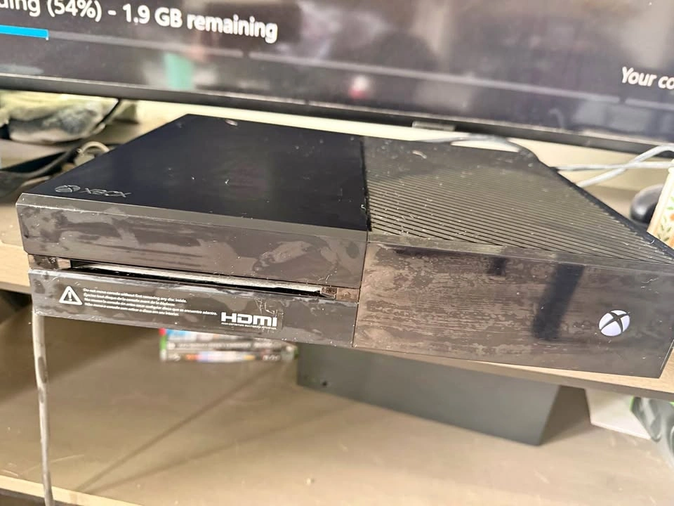 Xbox One console with 2 controllers and 5 games
