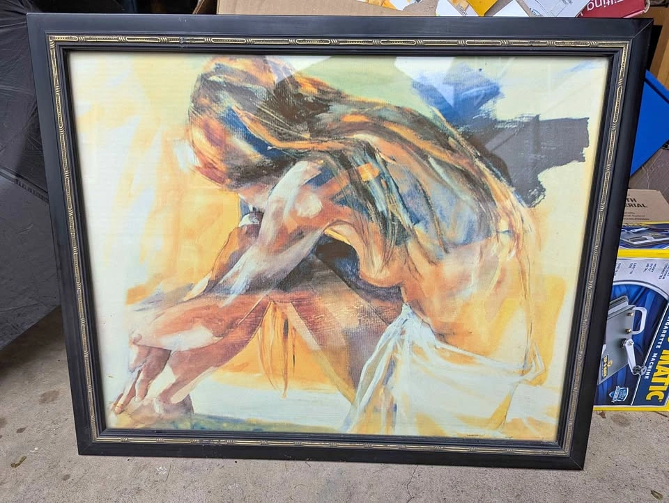 Christine Comyn– Woman yellow print, with Black Frame