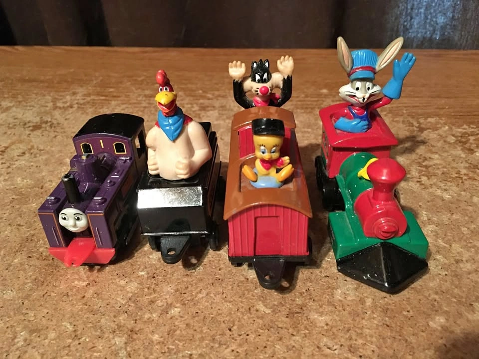 Lot of 4 1989 Ertl Looney Tunes & 1995 Thomas Train