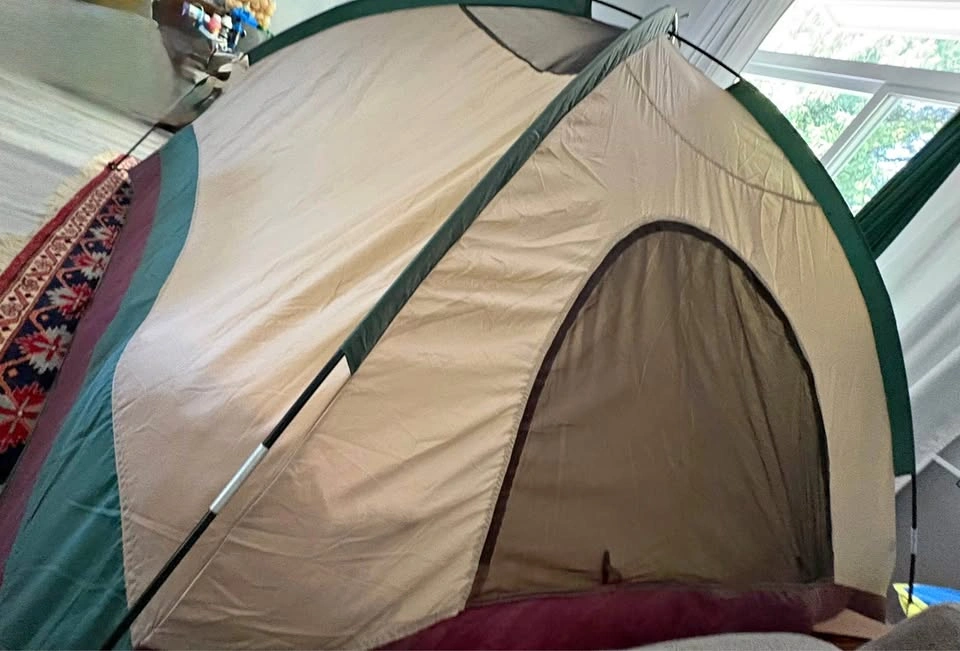 4 person tent with poles, good condition, includes rain guard