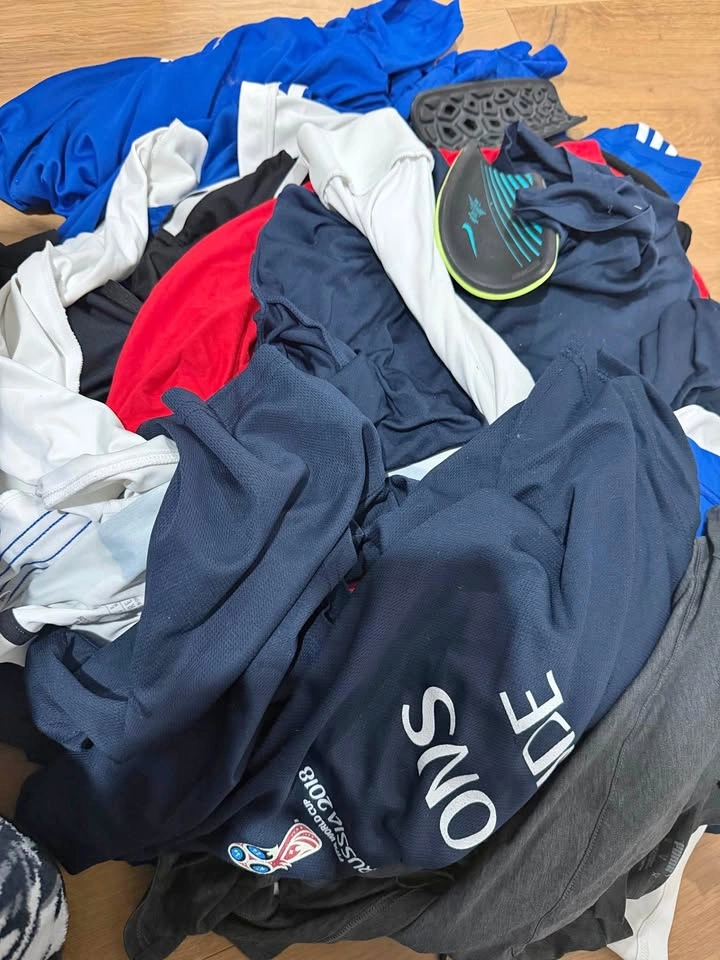 Extremely large pile of soccer clothes