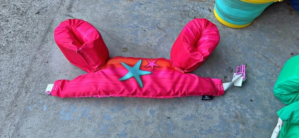 Pink kids flotation device /life jacket