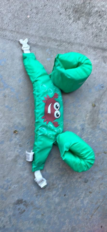 Green kids life jacket/ pool floaty