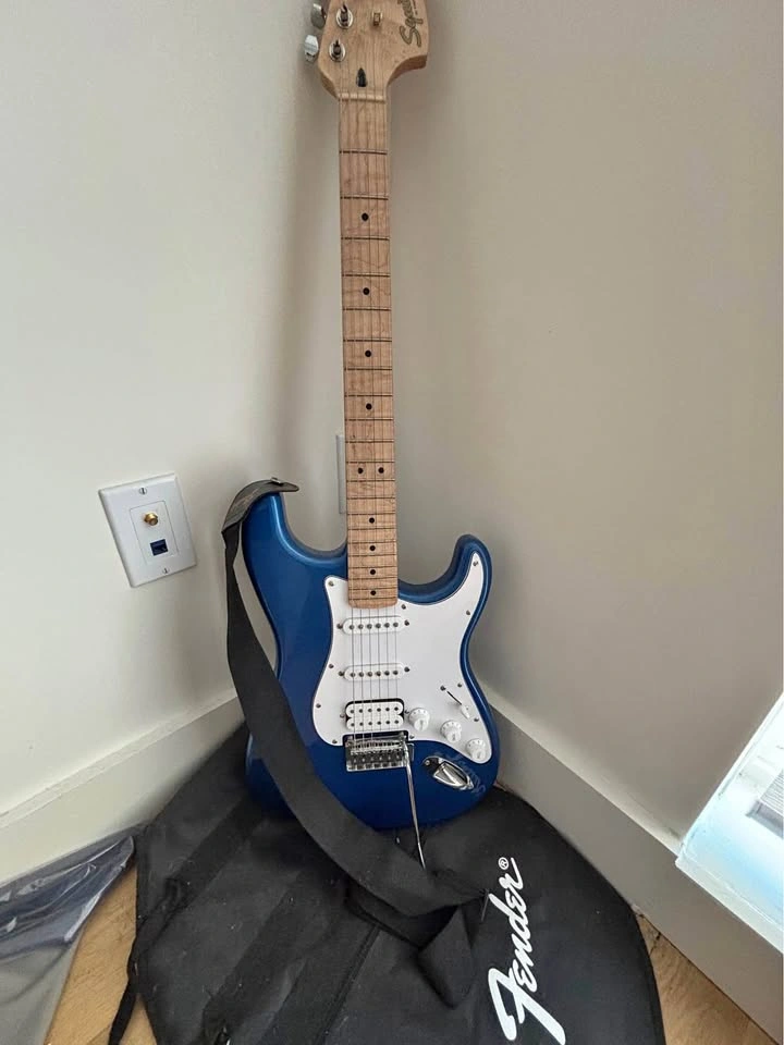 Squier Stratocaster Electric Guitar and Fender Frontman 15G Amp