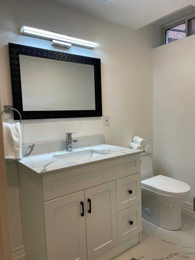 CLEAN, BRIGHT, LEGAL BSMT ROOM WITH PRIVATE BATH & PARKING - photo 2