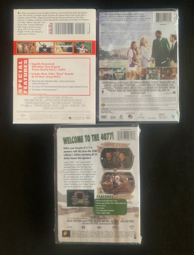 New! Sealed DVD movies - Animal House, BlindSide, MASH - $4 & up image indicator(2)