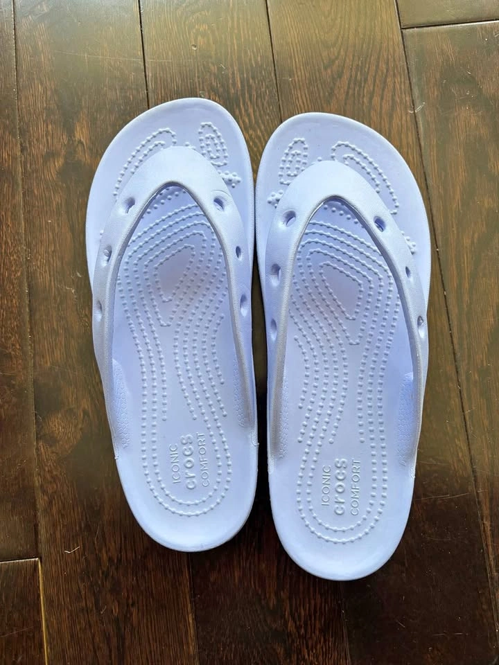 Brand new name brand flip flop crocs never worn! Size Women’s 6
