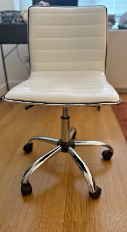 White chair with wheels and adjustable height