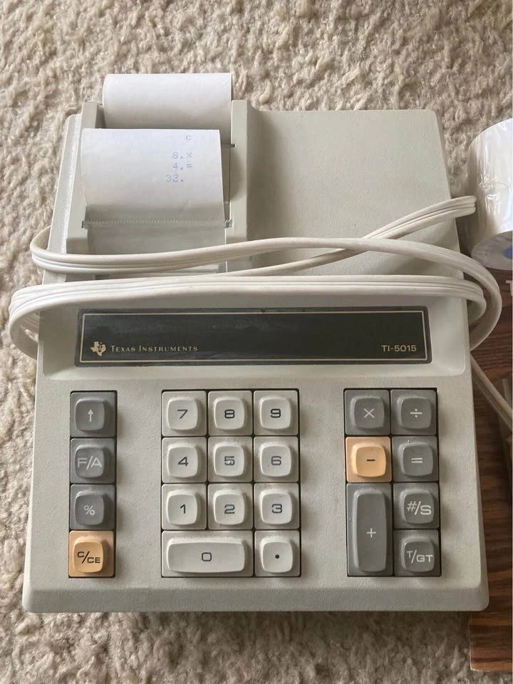 Vintage Texas Instruments electronic printing calculator T1-5015