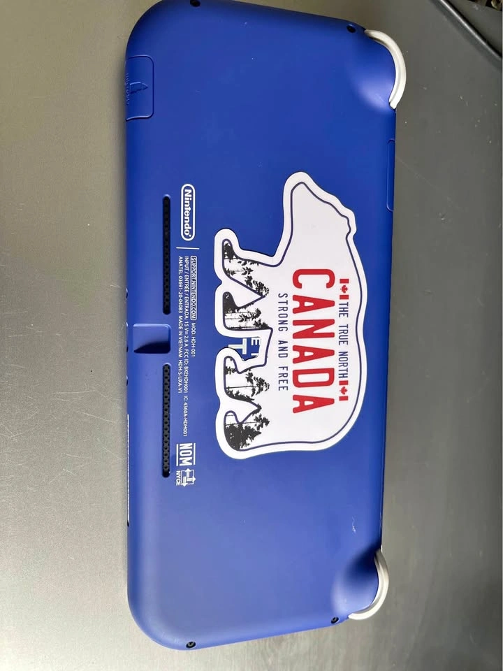 Blue Nintendo Switch Lite and Super Mario Party
