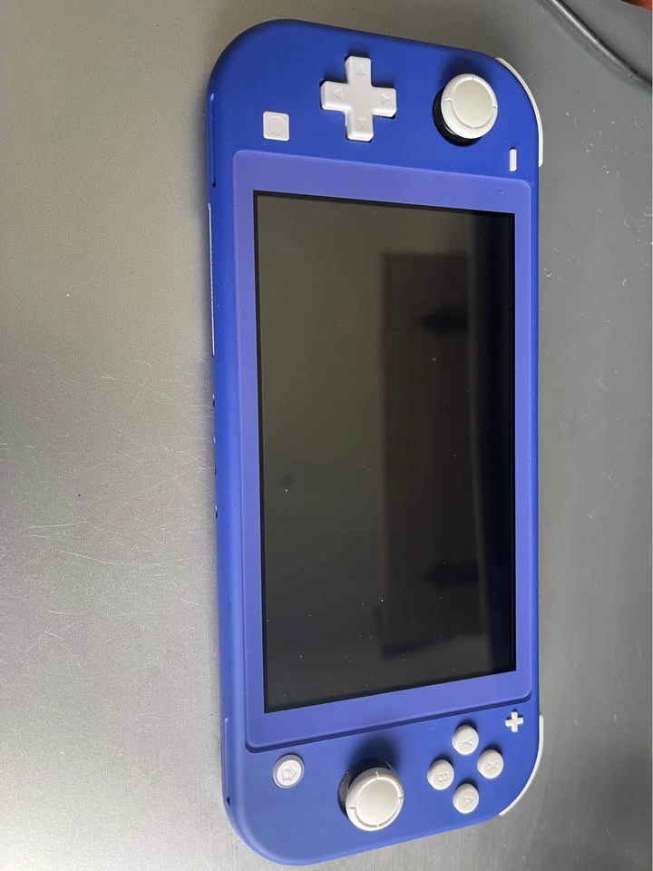 Blue Nintendo Switch Lite and Super Mario Party - photo 2