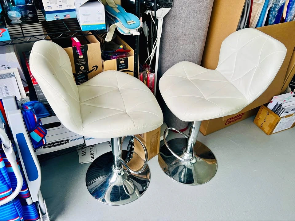 Two garage / basement white chairs, need love and upgrade.