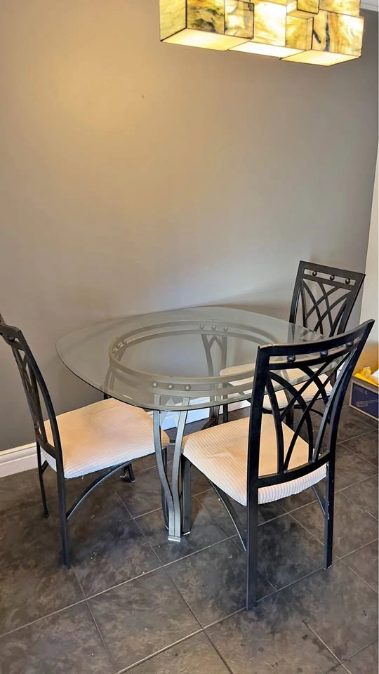 Glass Dinner table and 4 chairs