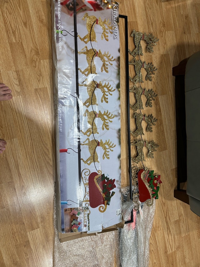 Fireplace stocking hanger metal rack