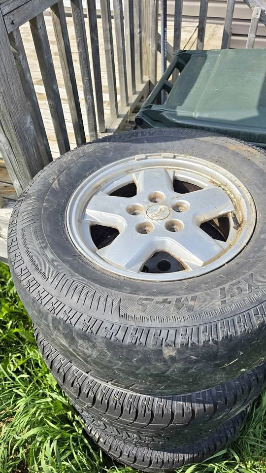 Set of 4 Arctic Claw 235/75R16 Tires with Rims for sale or trade