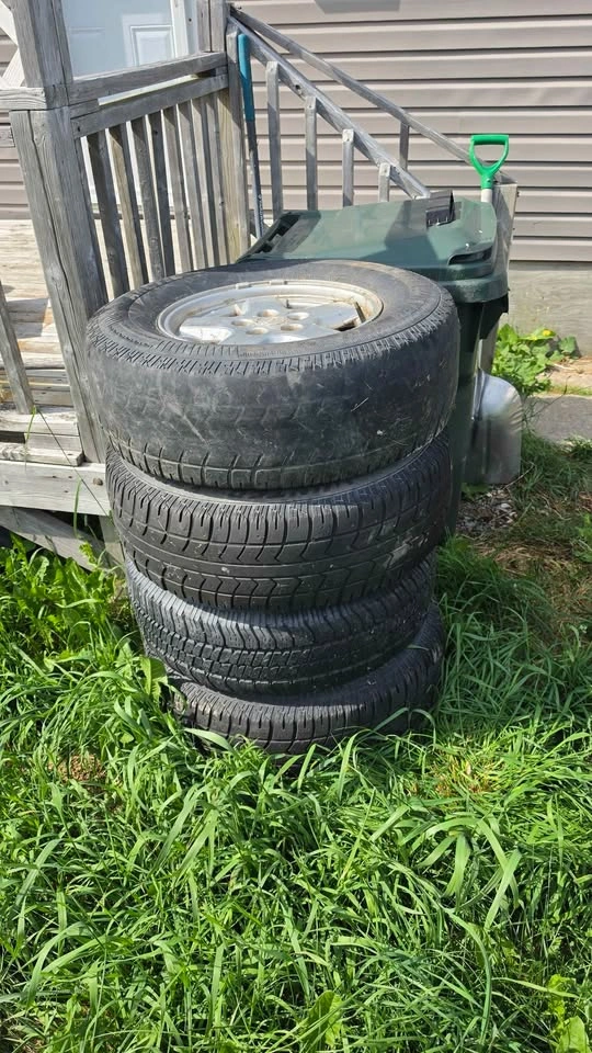 Set of 4 Arctic Claw 235/75R16 Tires with Rims for sale or trade - photo 2