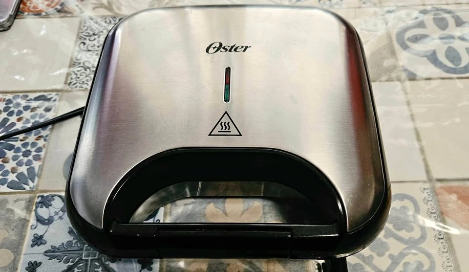 Moving out sale - Oster sandwich maker in good condition