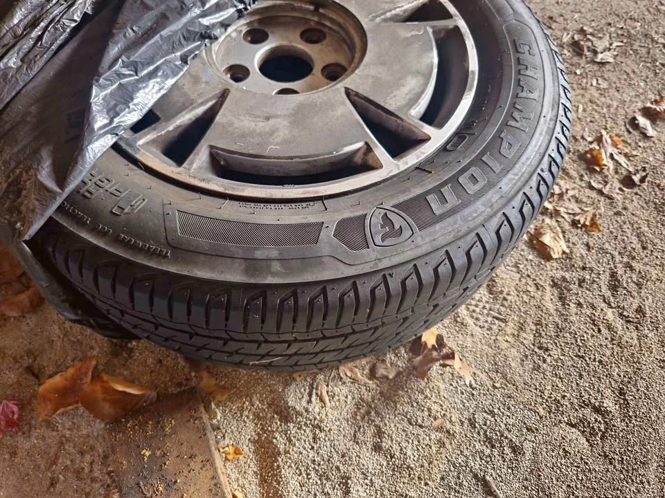 4 Firestone Champion Tires on Steel Rims 195/65R15 Honda Civic
