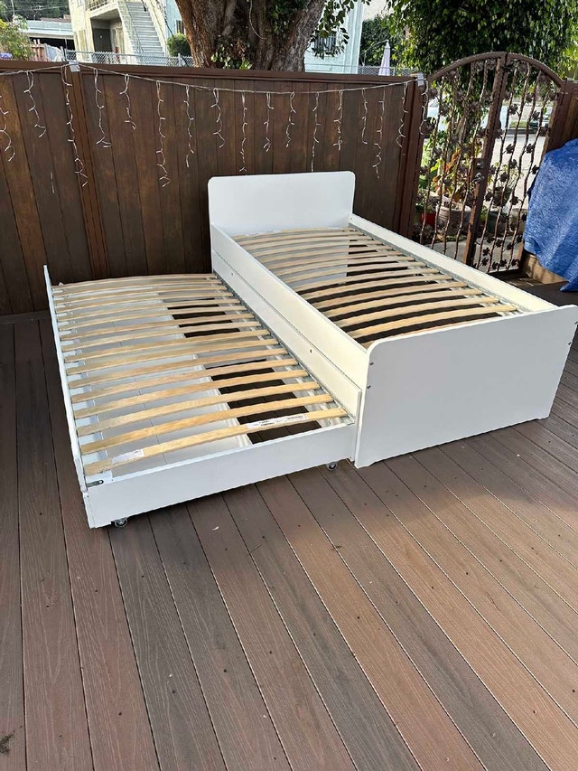 Twin size bed frame with trundle bed