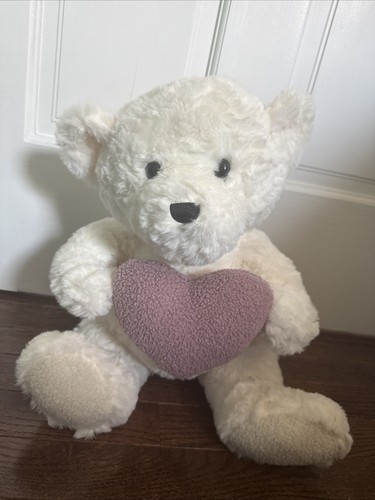 White Stuffed Bear Holding A Heart