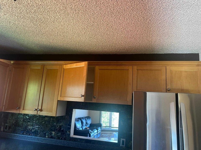 Kitchen cabinets and counters - photo 2